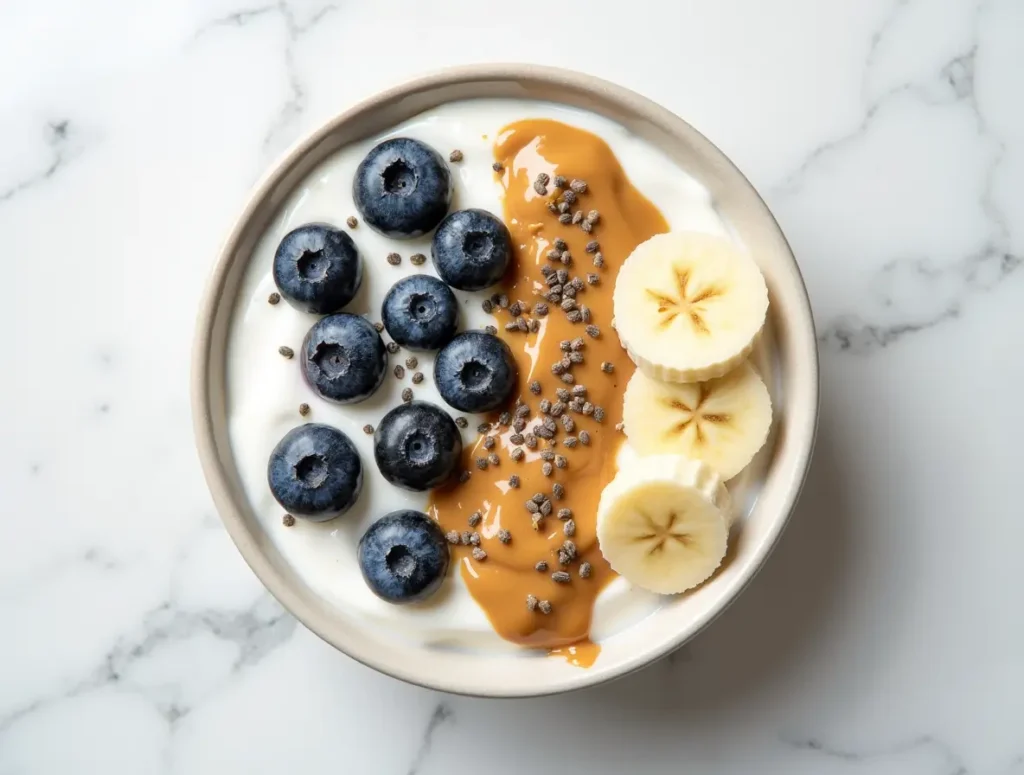 Chobani Plain Nonfat Greek Yogurt: High-protein yogurt bowl with fruit